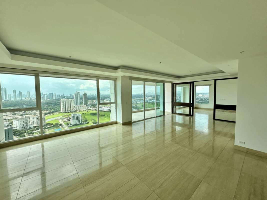 Bright family room or TV den area with marble floors in PH Solana Santa María luxury apartment Panama