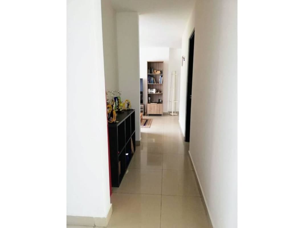 Balcony with tiled floor, glass railing, garden views, PH Pine Hills Albrook Panama apartment