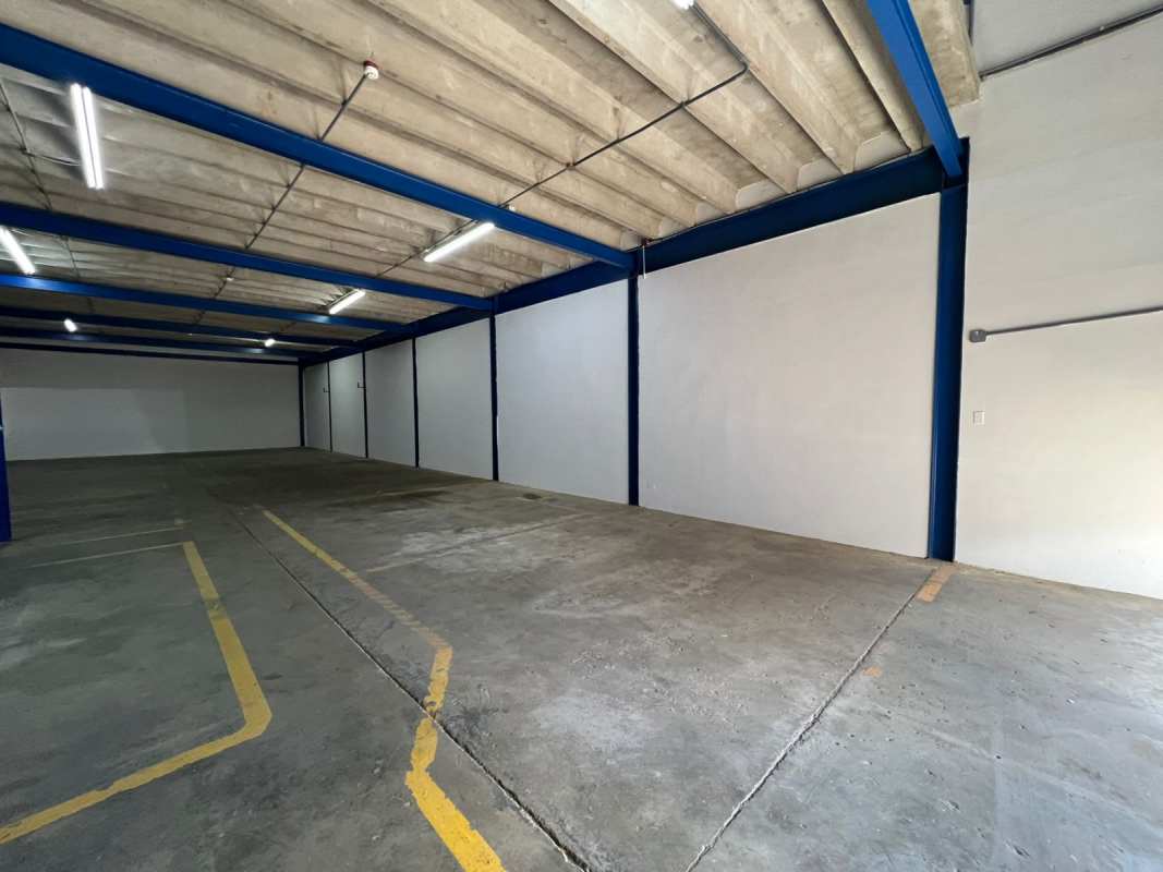 Covered parking and entry to warehouse inside Los Pueblos Business District Panama