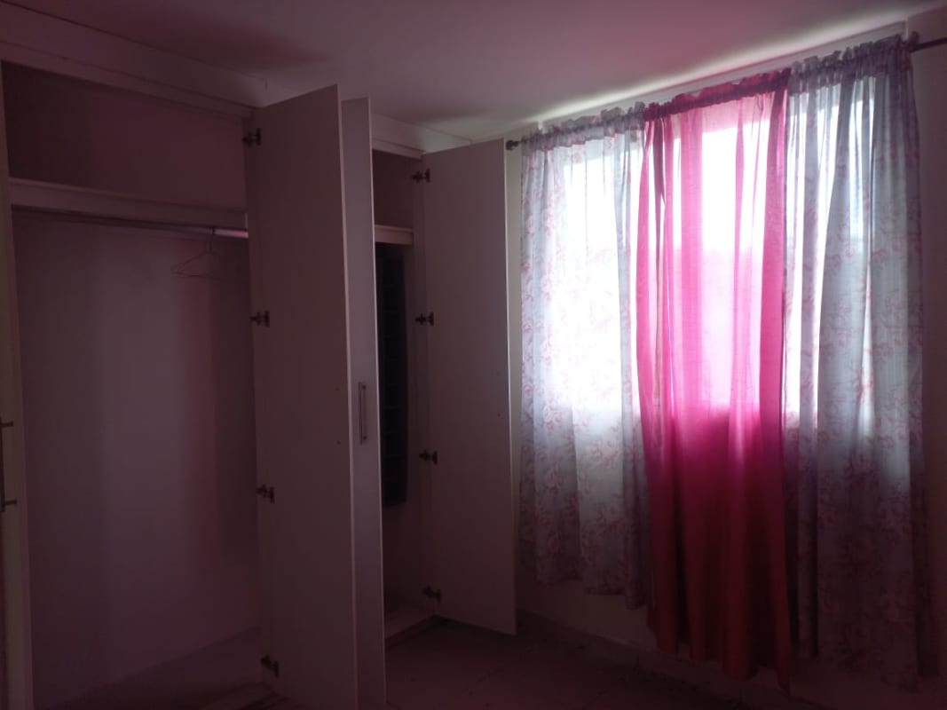 Bedroom in Mallorca Park Village apartment with open closet and natural light Los Andes Panama