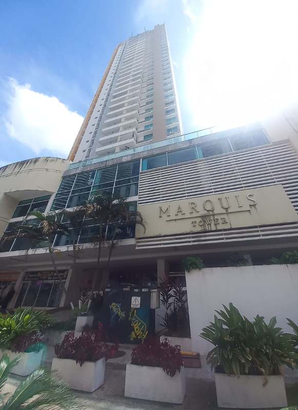 Living room in Marquis Tower apartment with large windows and city view Panama