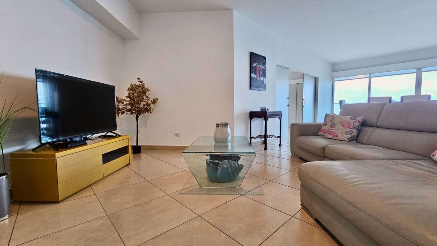 Master suite with balcony, ocean view and large windows in Punta Pacifica Panama