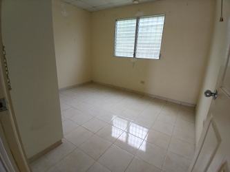 Empty bedroom with tiled flooring and wardrobe space in Lago Emperador Nuevo Emperador Panama