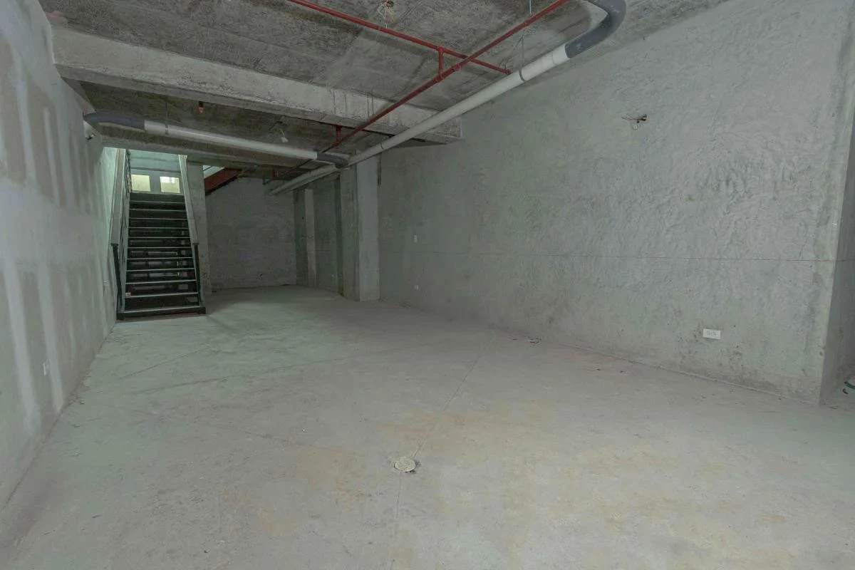 Unfinished interior with large windows facing street Casa Contemporánea Casco Viejo Panama