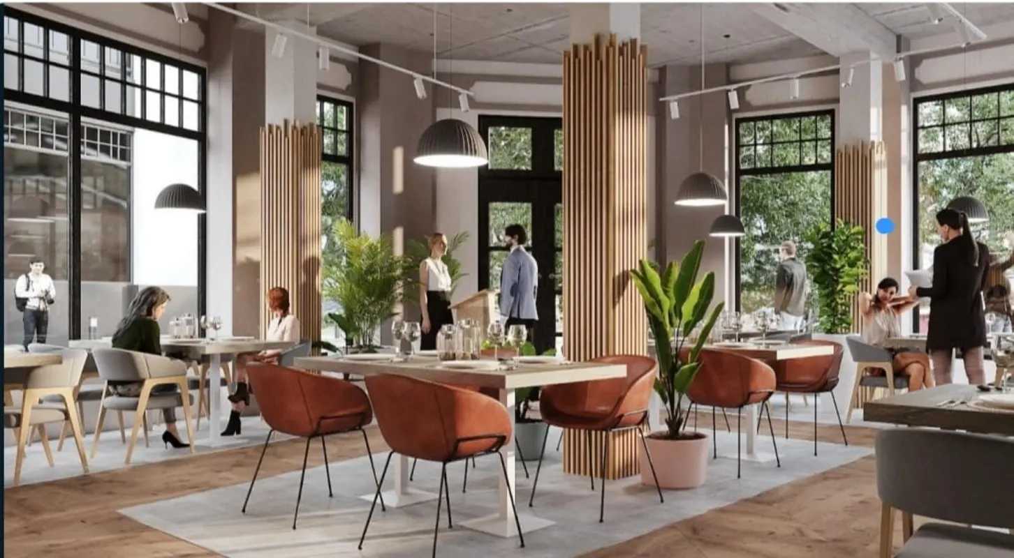 Modern dining space large windows pendant lights inside colonial building Casco Viejo Panama