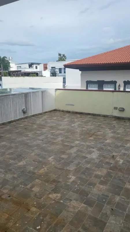 Covered rooftop terrace with hot tub and urban views Casco Viejo Panama restaurant rental