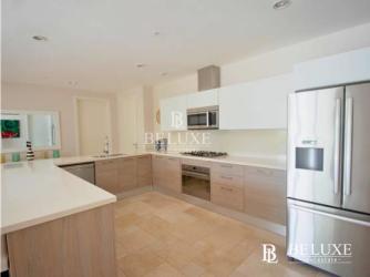 Modern bathroom with double sink granite vanity in Buenaventura apartment