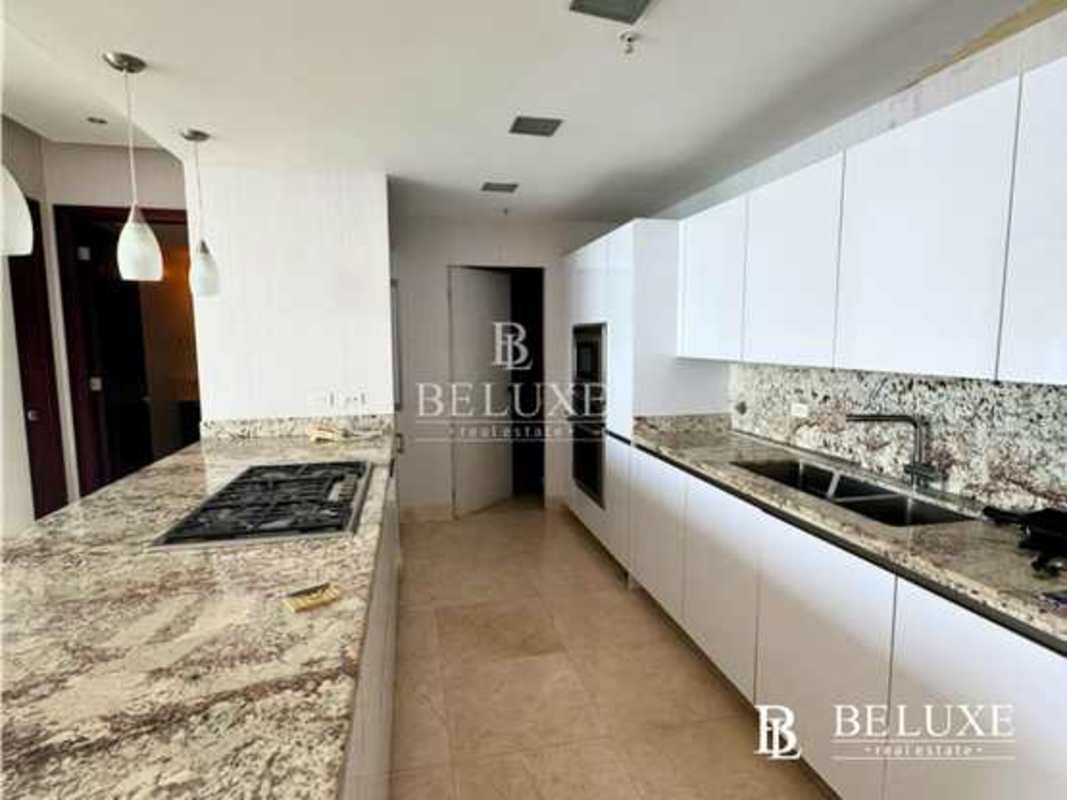 Spacious modern kitchen with granite countertops pendant lights PH Dupont Punta Pacifica Panama