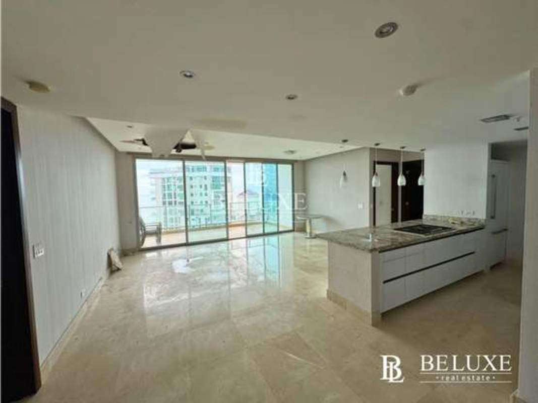 Spacious open concept living dining kitchen with balcony and ocean view at PH Dupont Punta Pacifica Panama