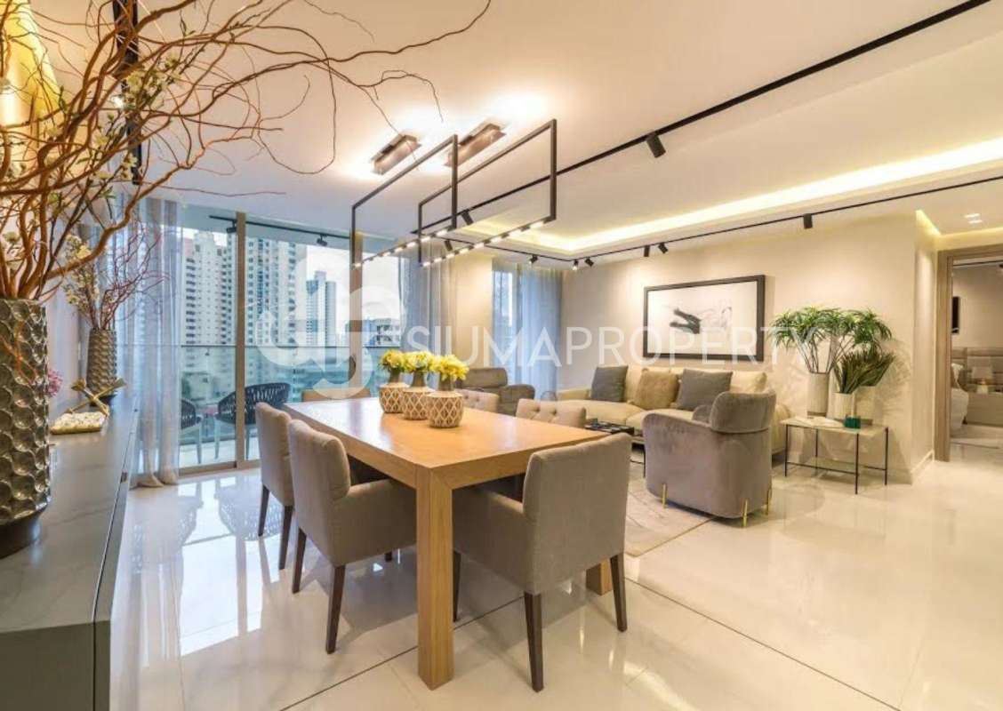 Ground-level dining terrace with waterfront view and landscaping PH Ocean Reef Residences Panama