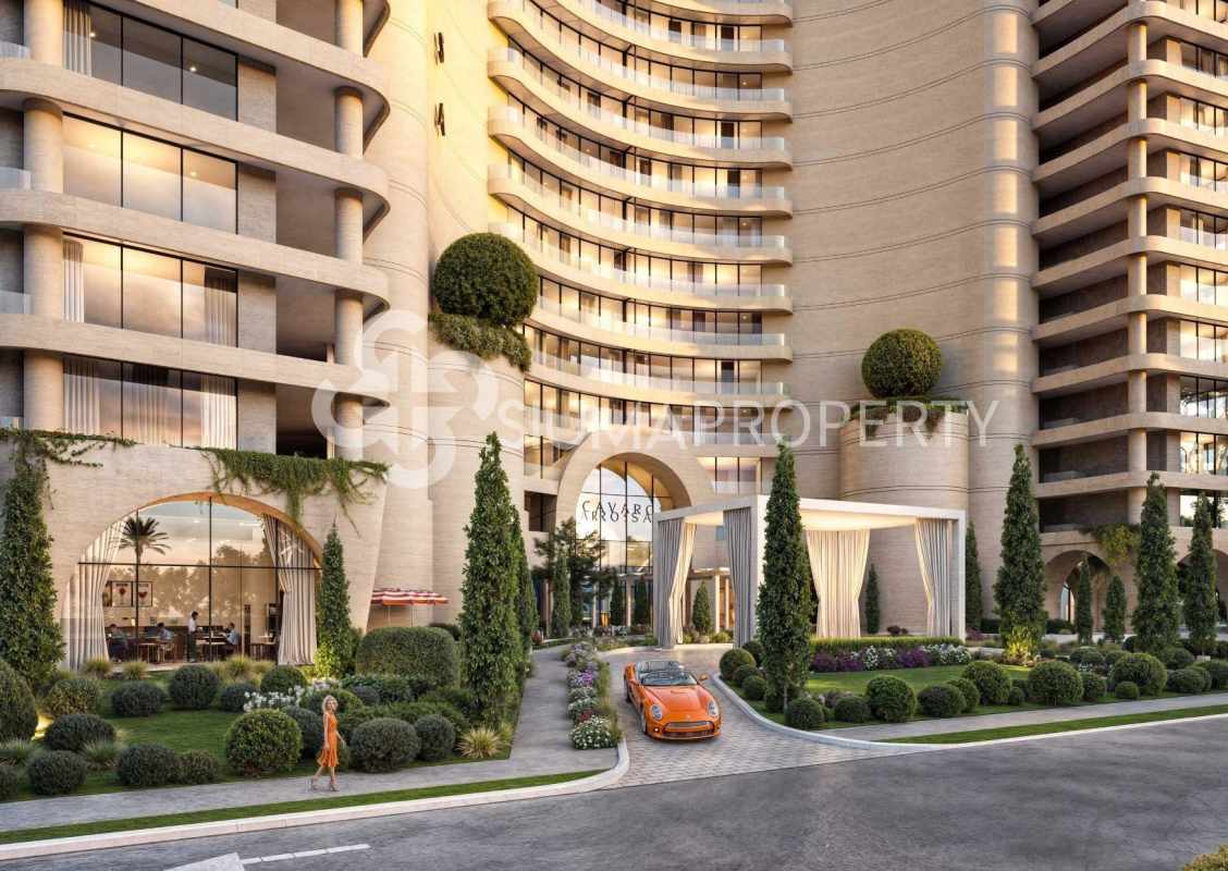 Contemporary curved white facade with green landscaping at PH Marina Residences Amador Panama