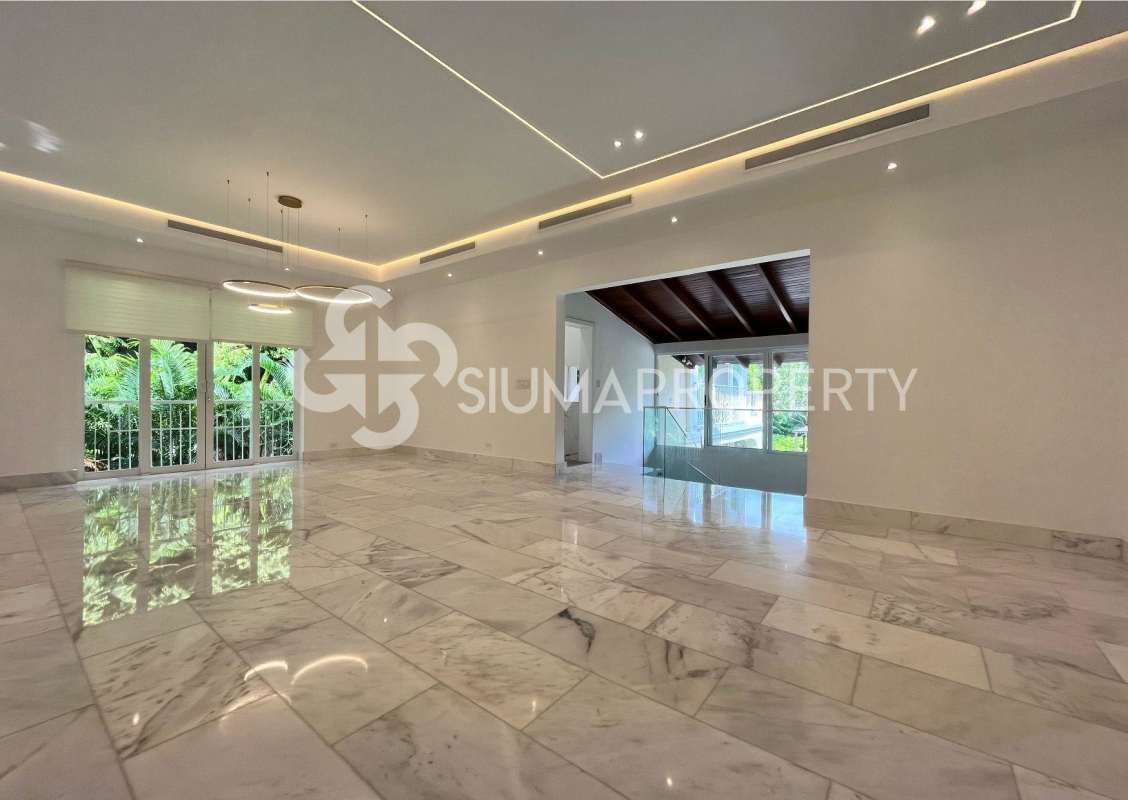 Modern marble flooring living room with large windows garden view Altos del Golf Panama