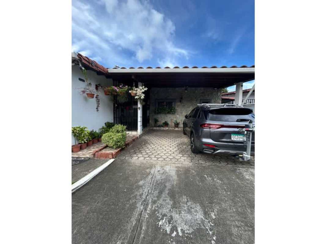 Spacious living area with tiled floors, split AC, ceiling fan and ample natural light in Chanis home