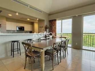 Open plan dining area connected to kitchen, bright and airy condo in Laguna Buenaventura Panama