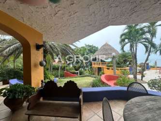 Covered outdoor terrace with oceanfront view at beachfront villa Punta Roca San Carlos Panama