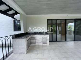 Outdoor covered terrace with granite counters for barbecue and dining Paseo de las Casas beach home Panama