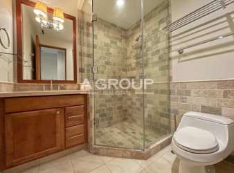 Bathroom with glass shower enclosure wood vanity Buenaventura Panama beach property
