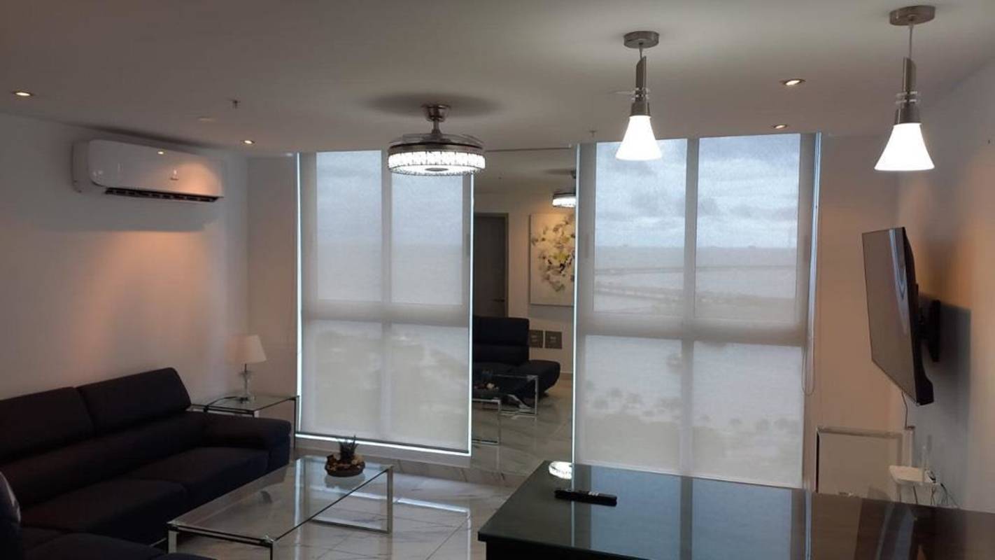 Luxurious bedroom with queen bed and bay views in PH The Sands Panama City