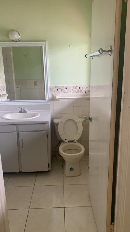 Simple restroom inside office unit Abou Saad building Albrook Panama