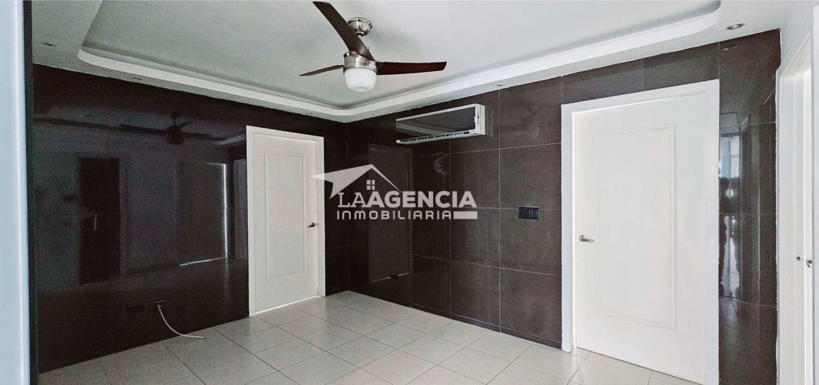 Bedroom featuring air conditioning, tiled floors, large windows with Panama skyline view in PH Tao