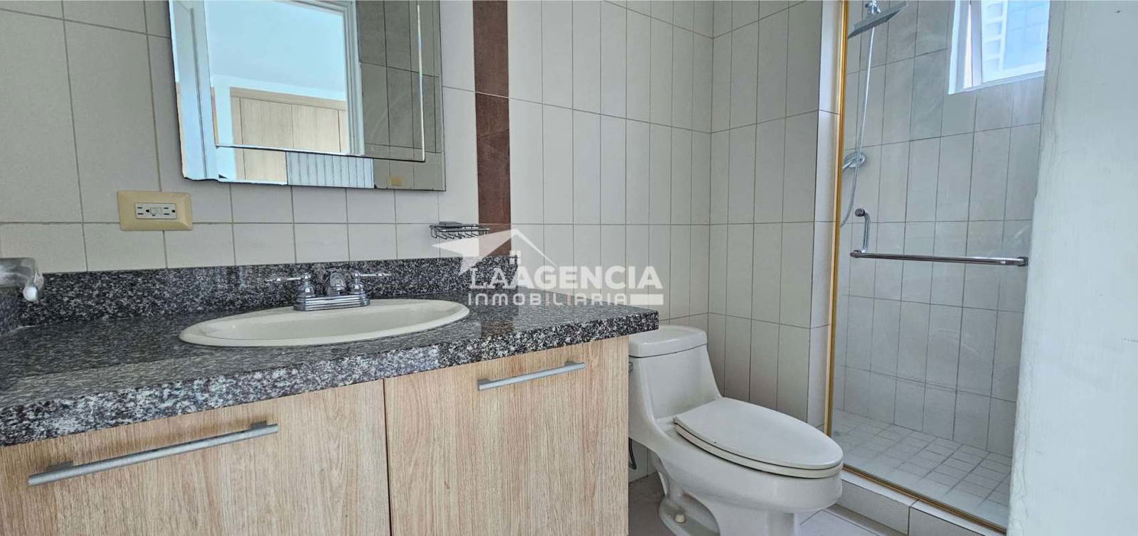 Covered balcony with safety netting, glass railing and skyline view PH Tao Panama