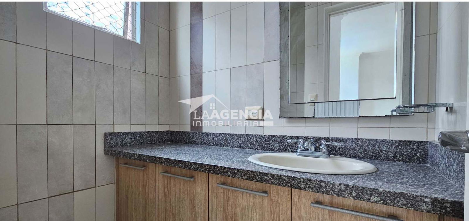 Children's colorful play area with slide and climbing features at PH Tao condominium Panama City