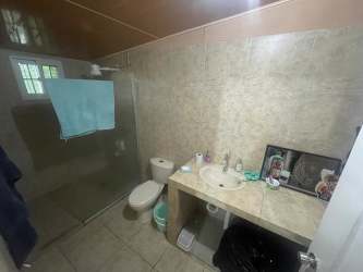 Functional kitchen granite counters dining area Sector Miraflores house for sale Penonome