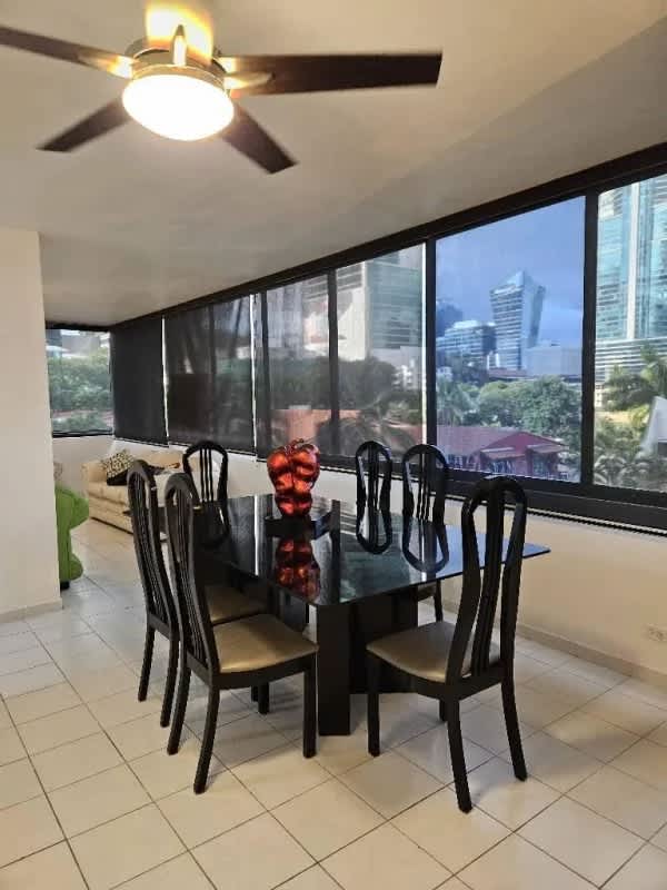 Furnished dining area with city views, ceramic floors, natural lighting PH Marbella Tower II Punta Paitilla Panama