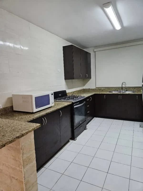 Spacious master bedroom with ceiling fan, split AC, large window ocean views PH Marbella Tower II Punta Paitilla Panama