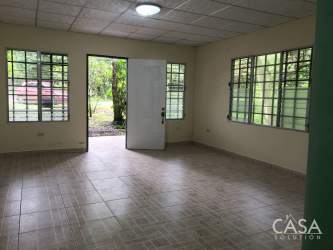 Living space with tiles, windows, door to outdoors in Brisas del Norte house