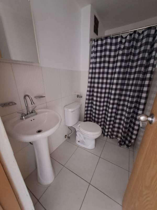 Functional bathroom with pedestal sink and shower in PH Llano Bonito Las Acacias Panama