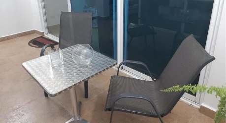 Resort style pool with palm trees surroundings at PH Terrazas de Farallón