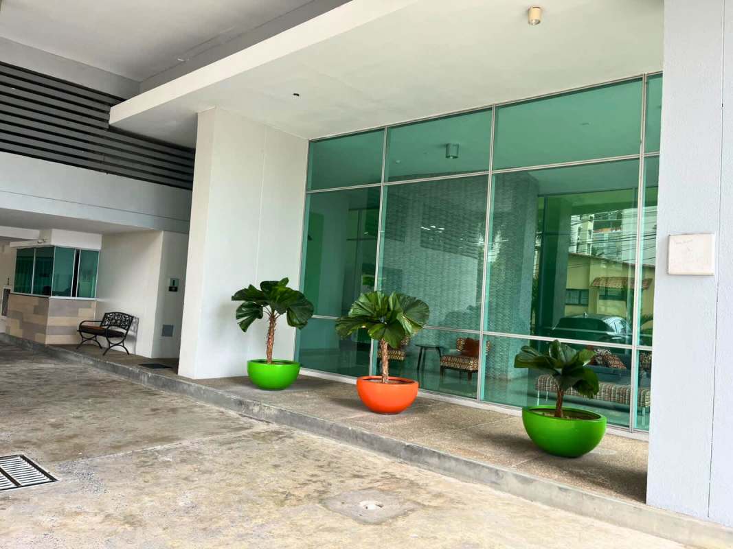 Modern kitchen with granite counters, stainless appliances at PH Via Porras San Francisco Panama