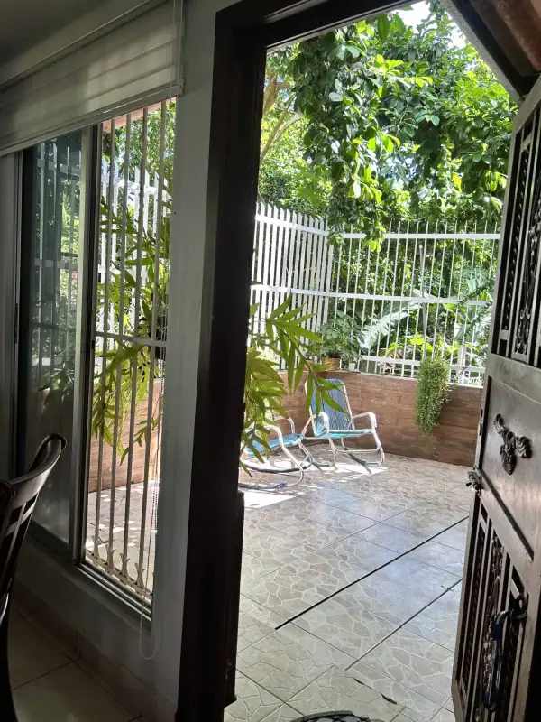Outdoor patio area with garden, fenced and tiled in PH Torres de Toscana Panama City