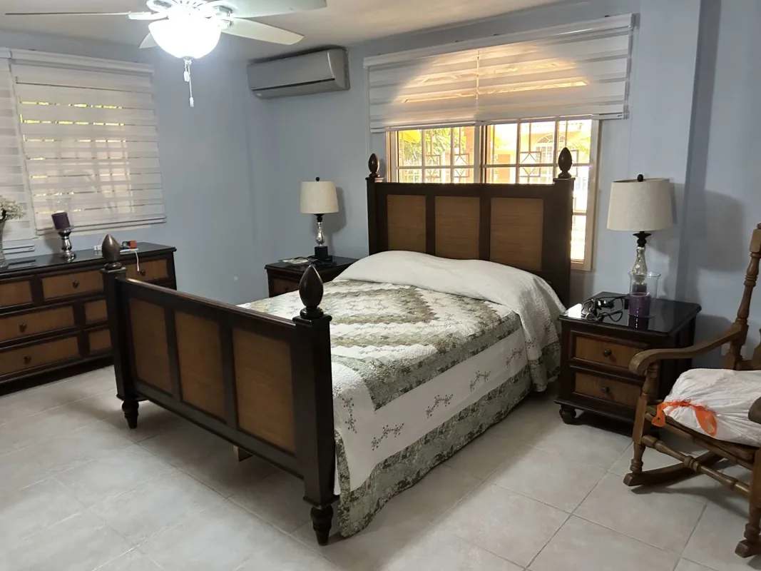 Spacious bedroom with closet, garden views, and AC in PH Torres de Toscana Condado del Rey