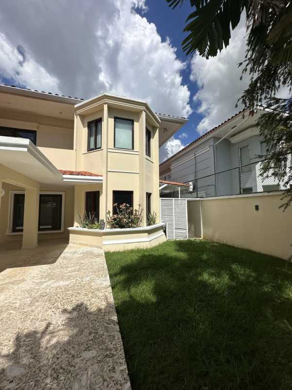 Contemporary kitchen with stainless appliances, mosaic backsplash and breakfast nook Las Camelias Costa del Este