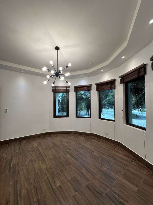 Spacious bedroom master suite with large windows and walk-in closet in Las Camelias Costa del Este