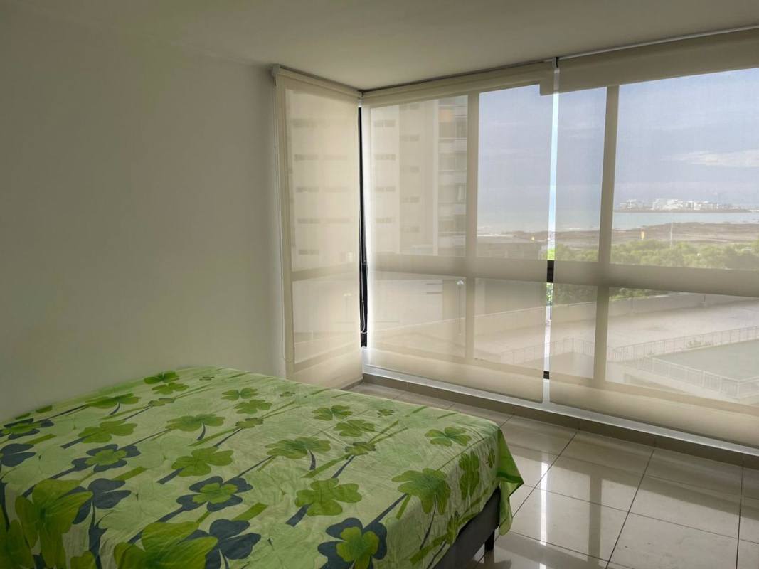 Modern kitchen with granite counters, wood cabinetry, gas stove PH San Francisco Bay Panama