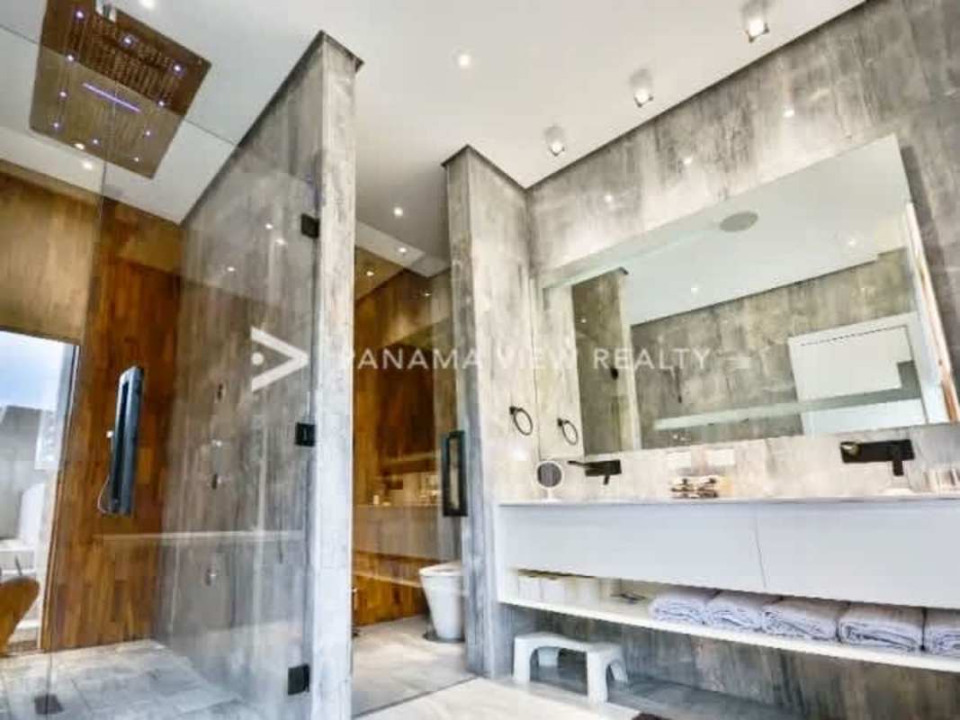 Spacious master suite with panoramic windows and Pacific Ocean views PH Ocean Reef