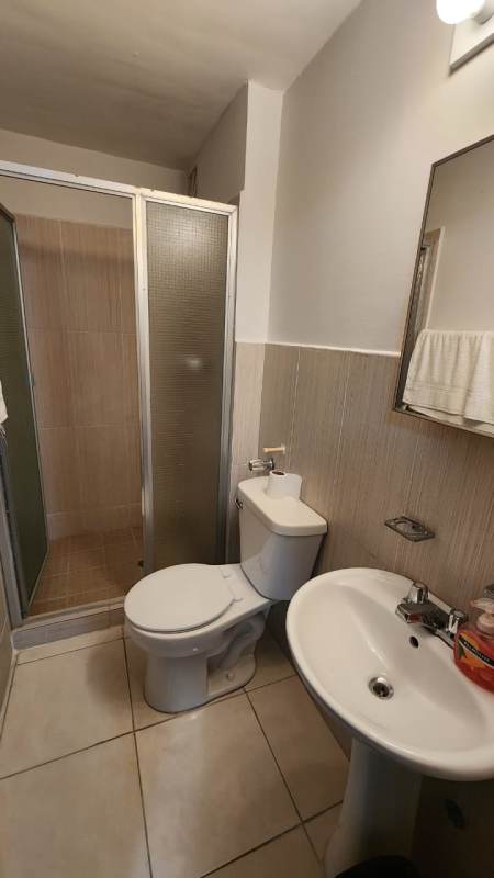 Contemporary bathroom with glass shower enclosure PH Llano Bonito Don Bosco Panama