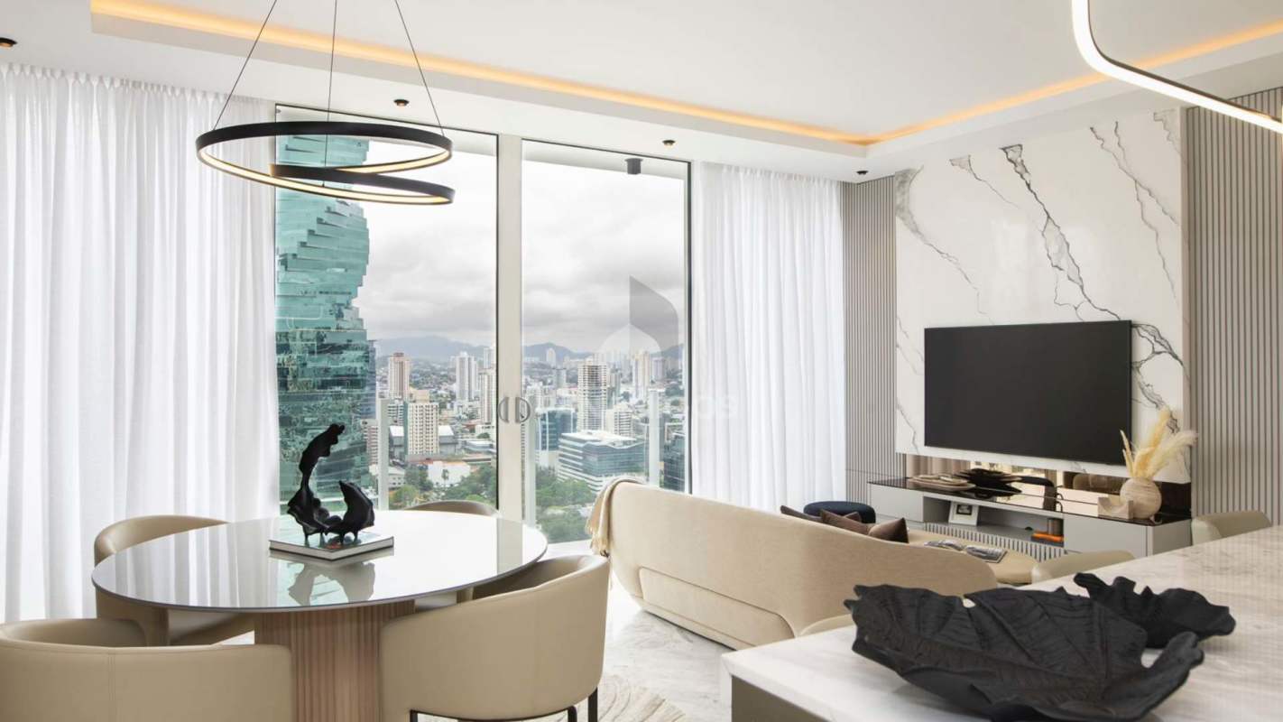 Living room in luxury condo with marble walls and city view at Wanders Yoo Panama