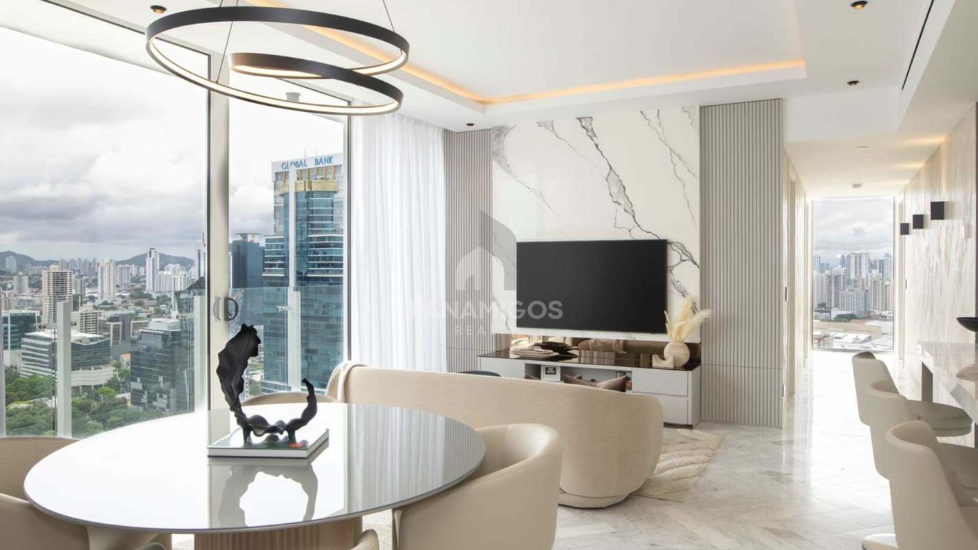 Luxury apartment dining and living area with panoramic skyline views in Wanders & Yoo Marbella Panama