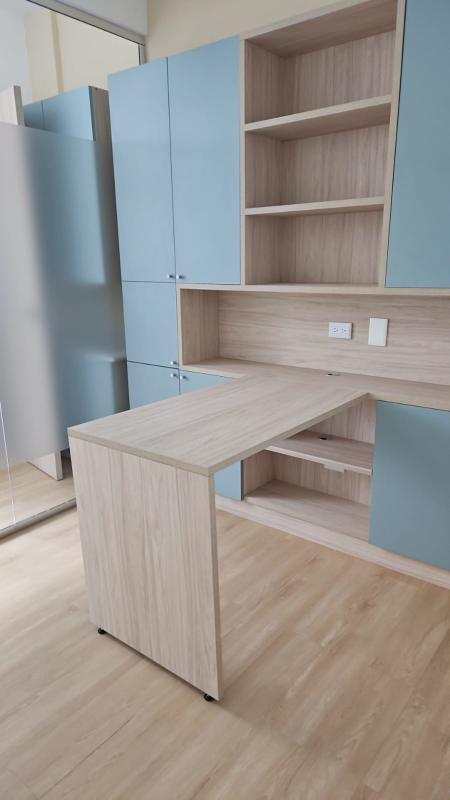 Modern waiting room with reception desk inside medical office for rent