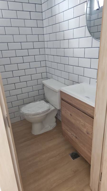 Medical consultation room with adjustable bed and cabinetry San Fernando Tower