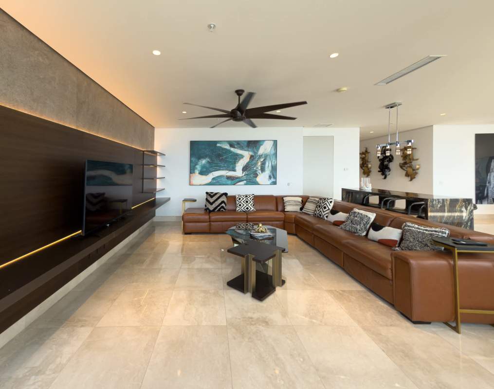 Modern kitchen with granite countertops, stainless appliances and breakfast bar in PH Matisse Costa del Este Panama