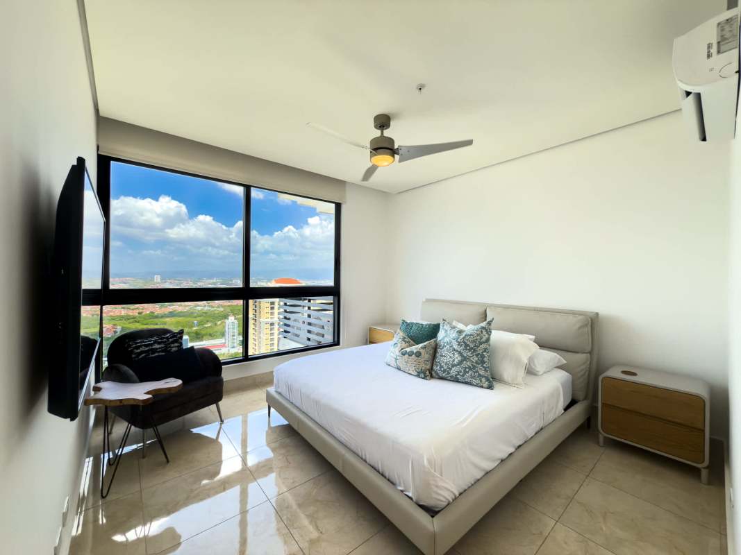 Modern bathroom with walk-in glass shower and double sinks at PH Matisse Costa del Este Panama