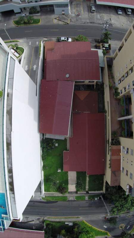 Two-story house with porch and garden at redevelopment property in San Francisco Panama