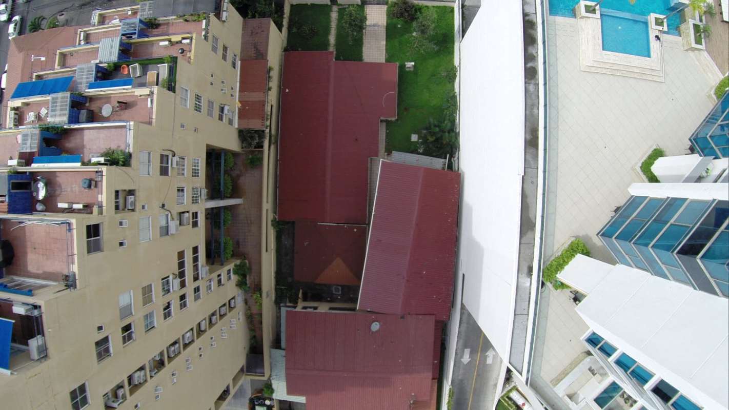 Cityscape aerial showing highways, towers, parks near Coco del Mar redevelopment land