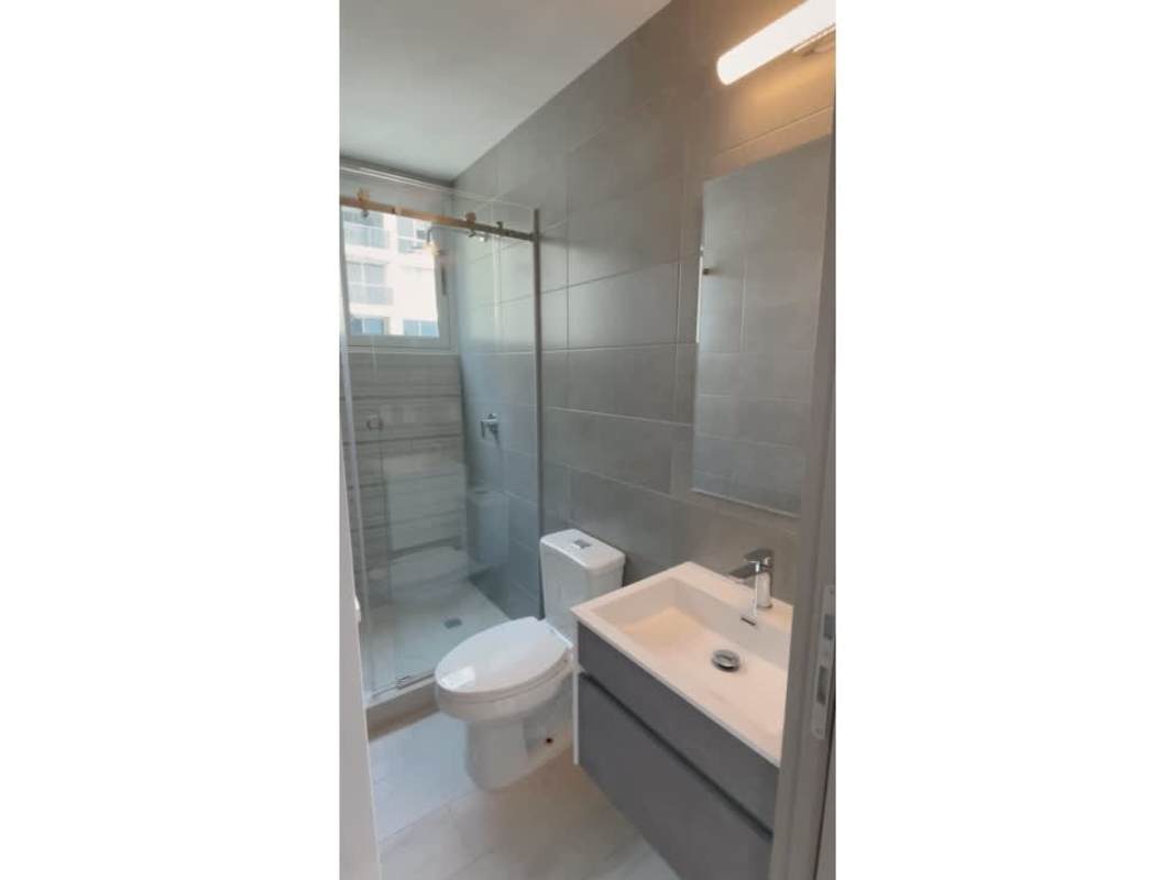 Bedroom with large windows and skyline views in PH Corpus Obarrio Panama