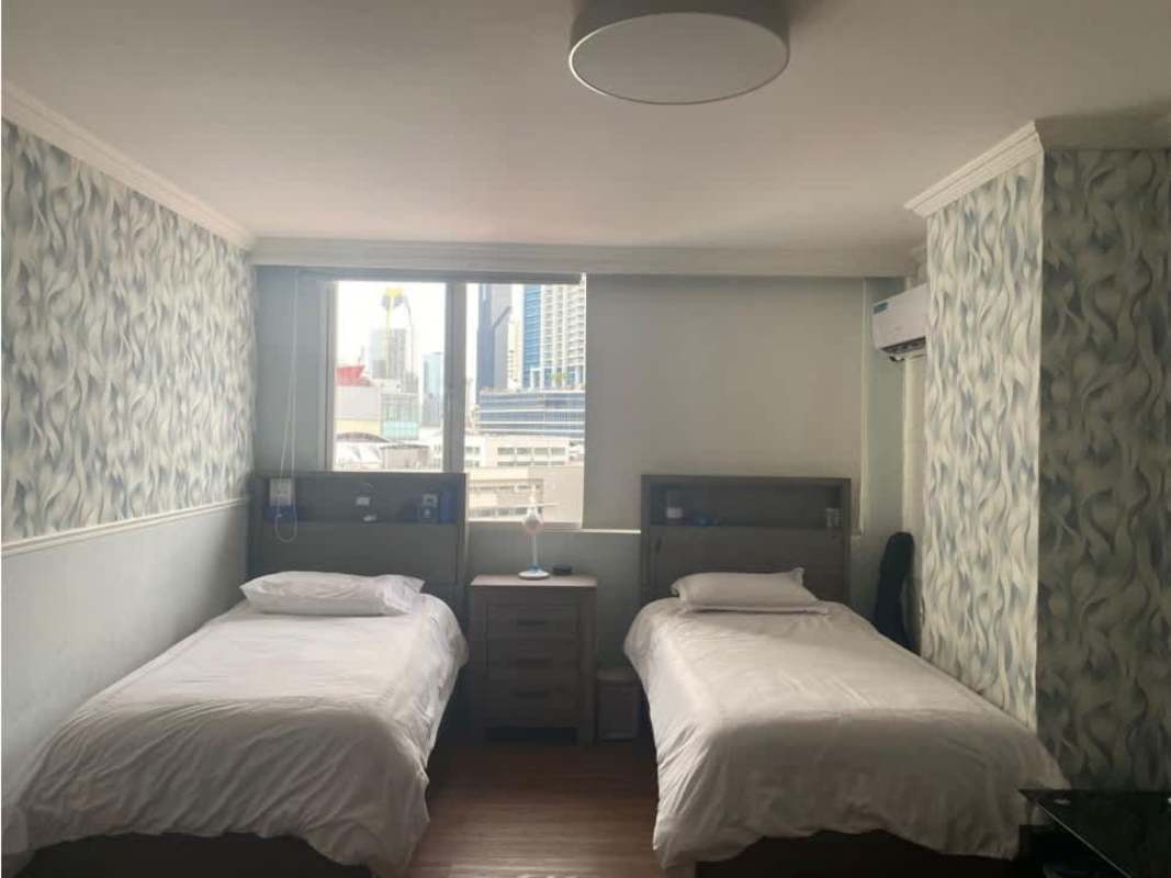 Kitchen featuring granite island and stainless fridge PH Ritz Paitilla Panama